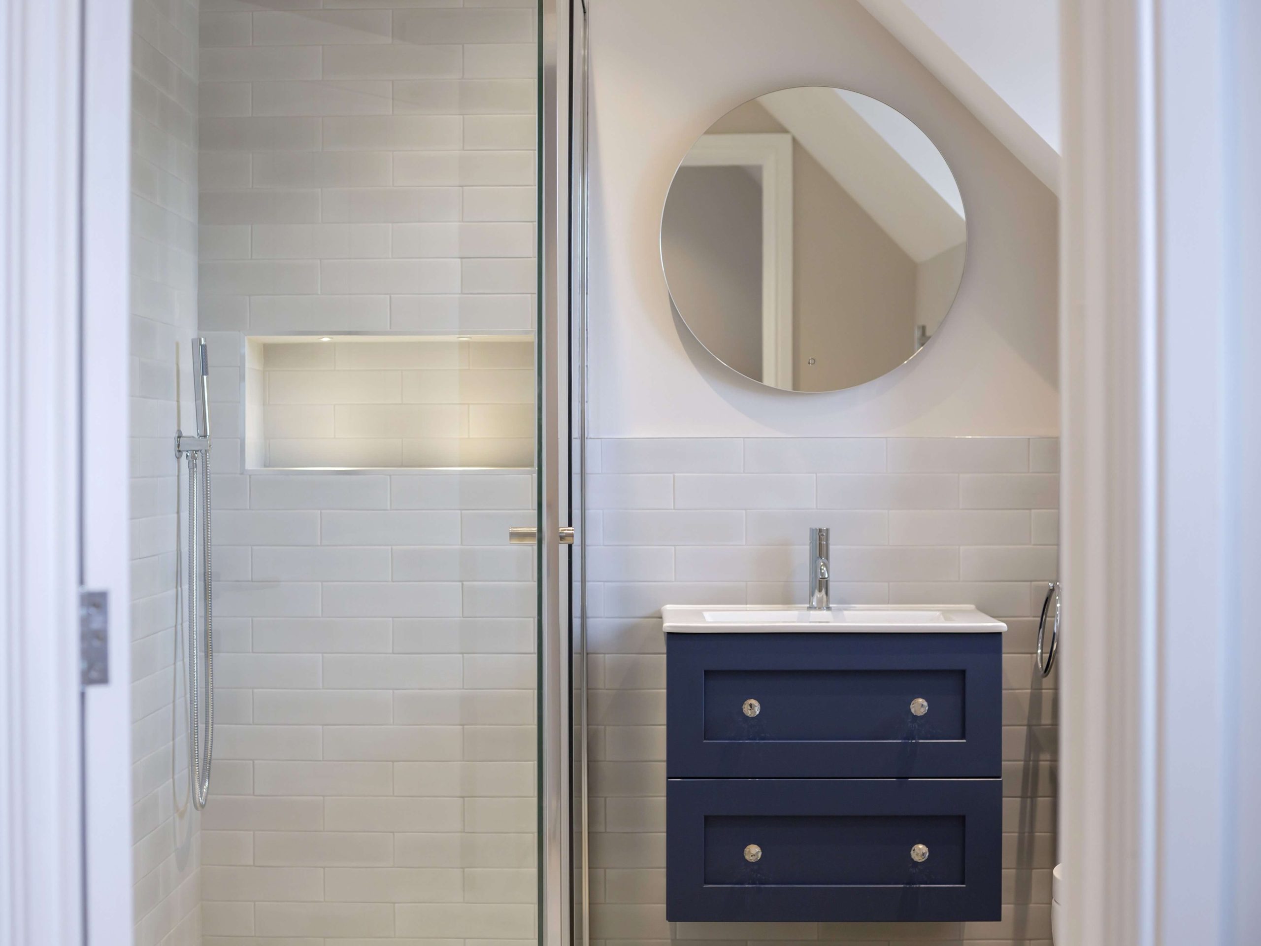 Explore three bathroom spaces we designed in a Chichester home renovation