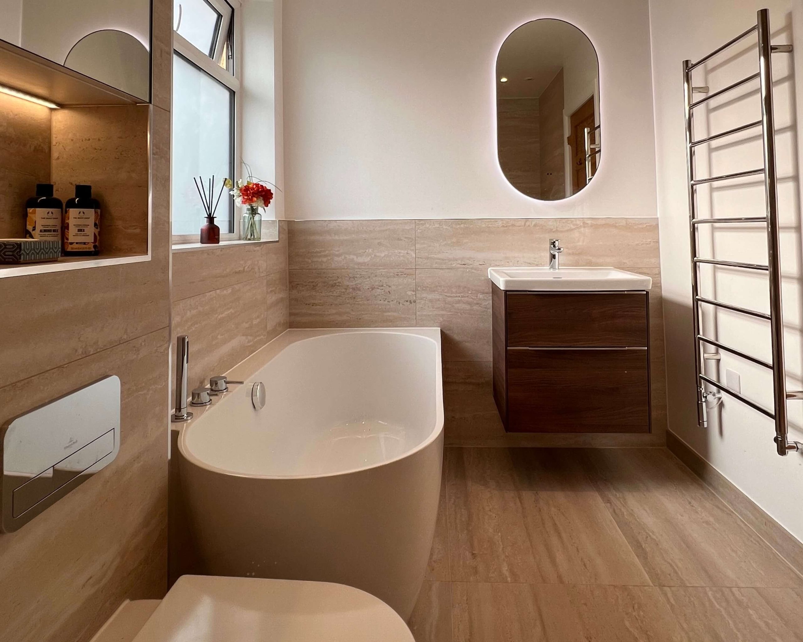 We help a client transform a dated space into a modern bathroom retreat with spa-like qualities